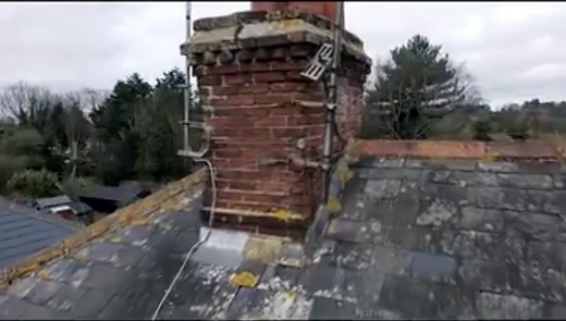 Slate roof and brick chimney